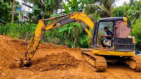 operating a mini excavator on slopes|mini excavator training for beginner.